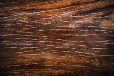 Dark wood texture background surface with old natural pattern. Walnut wood texture. Close up walnut planks texture background.