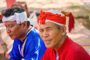 Phan Thiet City, VIETNAM - SEP 2 2022: Focus two Traditional Cham men. Cham people is one of the minority groups in Vietnam.They are also called Champa people. Travel concept.