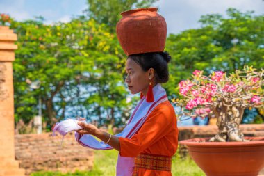 Phan Thiet City, VIETNAM - SEP 2 2022: Traditional Cham girl Dance at the temple Po Sah Inu. Cham people is one of the minority groups in Vietnam.They are also called Champa people. Travel concept.
