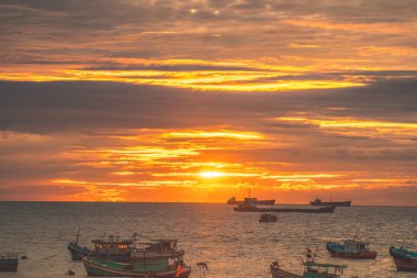 Calm sea with sunset sky and sun through the clouds over. Calm sea with sunset sky and sun through the clouds over. Meditation ocean and sky background. Tranquil seascape. Horizon over the water.