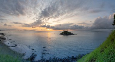 Hon Ba temple (Vietnamese language is Mieu Hon Ba) is a small pagoda in island in Vung Tau City, Vietnam. Beautiful cloudscape over the sea, sunrise shot. Background and travel concept