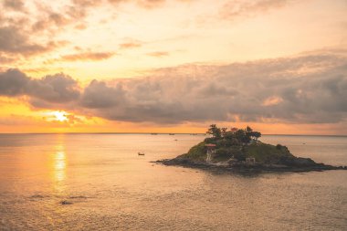 Hon Ba temple (Vietnamese language is Mieu Hon Ba) is a small pagoda in island in Vung Tau City, Vietnam. Beautiful cloudscape over the sea, sunrise shot. Background and travel concept