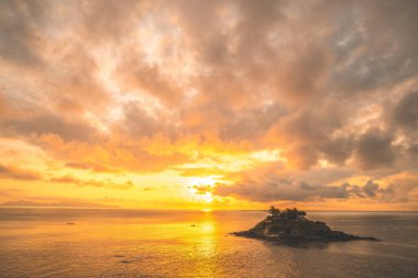 Hon Ba temple (Vietnamese language is Mieu Hon Ba) is a small pagoda in island in Vung Tau City, Vietnam. Beautiful cloudscape over the sea, sunrise shot. Background and travel concept