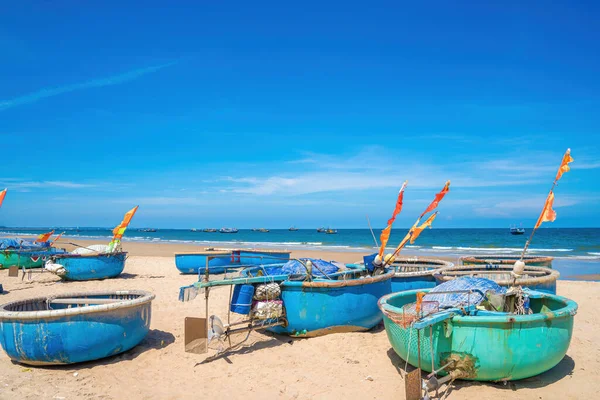 Aerial view of fishing village in Long Hai, Phuoc Hai. Tropical Seascape with a boat on sandy beach at cloudy. Beautiful tropical beach with small boat for travel and vacation in holiday relax time.