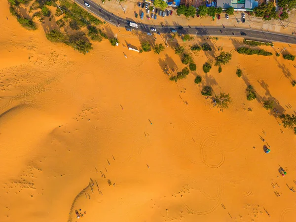 Top view Red Sand Dunes (local name is Doi Cat Do), also known as Golden Sand Dunes, is located near Hon Rom beach, Mui Ne, Phan Thiet city. This is an attractive tourist destination in Mui Ne.