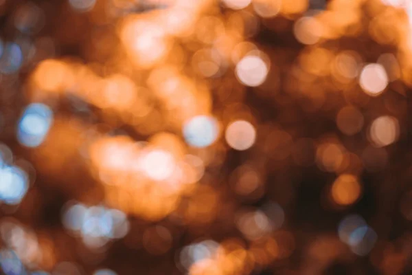 Yellow Bokeh of Light. Golden Bokeh of Light. Defocused light with black background. Night life light bokeh. Sparkle bokeh.