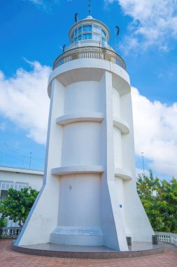 Focus white Lighthouse in Vung Tau. The most visited tourist location in the Vung Tau city and famous Lighthouse captured with blue sky and cloud.