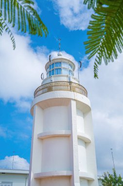 Focus white Lighthouse in Vung Tau. The most visited tourist location in the Vung Tau city and famous Lighthouse captured with blue sky and cloud.