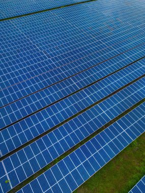 Top view of Solar panels on farm. Alternative source of electricity. solar panels absorb sunlight as a source of energy to generate electricity creating sustainable energy