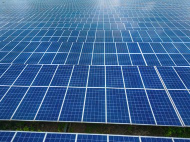 Top view of Solar panels on farm. Alternative source of electricity. solar panels absorb sunlight as a source of energy to generate electricity creating sustainable energy