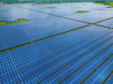 Top view of Solar panels on farm. Alternative source of electricity. solar panels absorb sunlight as a source of energy to generate electricity creating sustainable energy