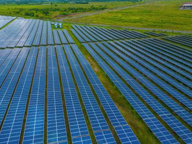 Top view of Solar panels on farm. Alternative source of electricity. solar panels absorb sunlight as a source of energy to generate electricity creating sustainable energy