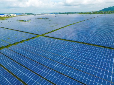Top view of Solar panels on farm. Alternative source of electricity. solar panels absorb sunlight as a source of energy to generate electricity creating sustainable energy