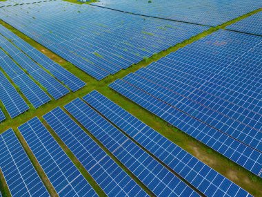 Top view of Solar panels on farm. Alternative source of electricity. solar panels absorb sunlight as a source of energy to generate electricity creating sustainable energy
