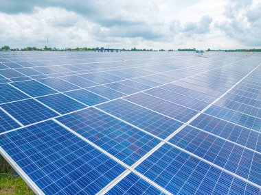 Top view of Solar panels on farm. Alternative source of electricity. solar panels absorb sunlight as a source of energy to generate electricity creating sustainable energy