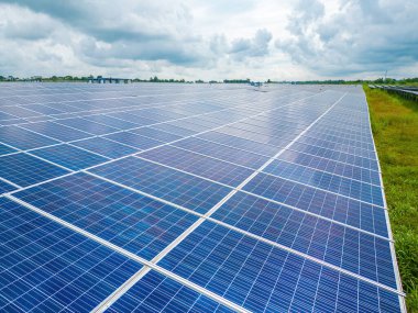 Top view of Solar panels on farm. Alternative source of electricity. solar panels absorb sunlight as a source of energy to generate electricity creating sustainable energy