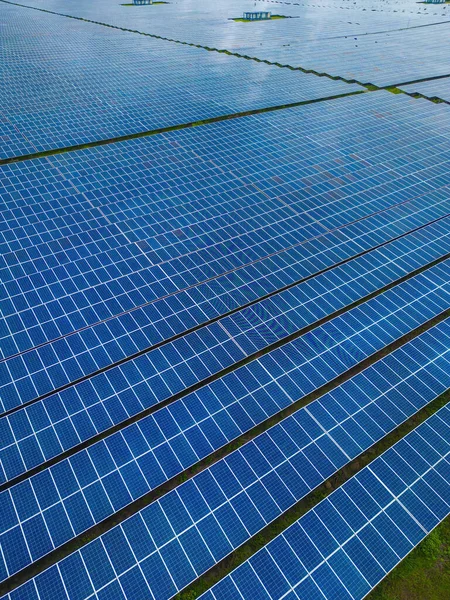 Top view of Solar panels on farm. Alternative source of electricity. solar panels absorb sunlight as a source of energy to generate electricity creating sustainable energy