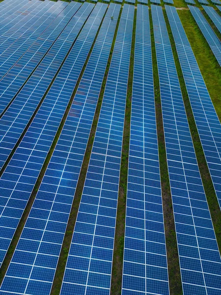 Top view of Solar panels on farm. Alternative source of electricity. solar panels absorb sunlight as a source of energy to generate electricity creating sustainable energy