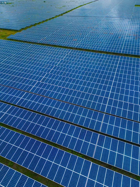 Top view of Solar panels on farm. Alternative source of electricity. solar panels absorb sunlight as a source of energy to generate electricity creating sustainable energy