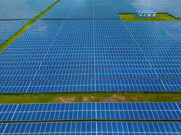 Top view of Solar panels on farm. Alternative source of electricity. solar panels absorb sunlight as a source of energy to generate electricity creating sustainable energy