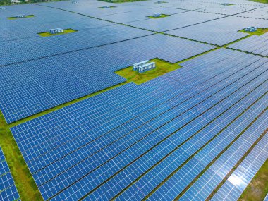 Top view of Solar panels on farm. Alternative source of electricity. solar panels absorb sunlight as a source of energy to generate electricity creating sustainable energy