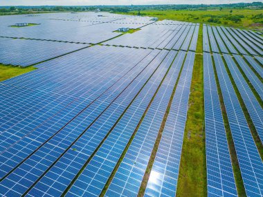 Top view of Solar panels on farm. Alternative source of electricity. solar panels absorb sunlight as a source of energy to generate electricity creating sustainable energy