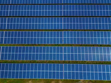 Top view of Solar panels on farm. Alternative source of electricity. solar panels absorb sunlight as a source of energy to generate electricity creating sustainable energy