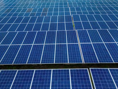 Top view of Solar panels on farm. Alternative source of electricity. solar panels absorb sunlight as a source of energy to generate electricity creating sustainable energy