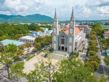 Top view of the Chanh Toa Church in Ba Ria Vung Tau. The light shines on the statue of the Virgin Mary.