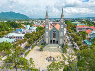 Top view of the Chanh Toa Church in Ba Ria Vung Tau. The light shines on the statue of the Virgin Mary.