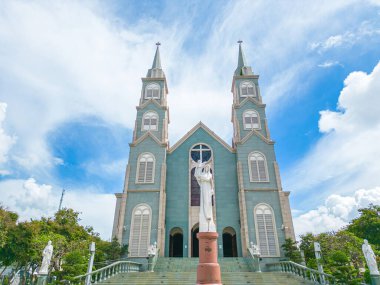 Top view of the Chanh Toa Church in Ba Ria Vung Tau. The light shines on the statue of the Virgin Mary.