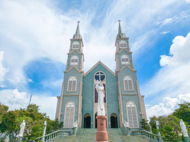Top view of the Chanh Toa Church in Ba Ria Vung Tau. The light shines on the statue of the Virgin Mary.
