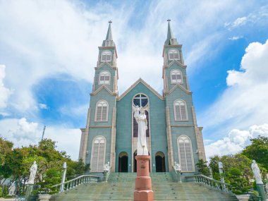 Top view of the Chanh Toa Church in Ba Ria Vung Tau. The light shines on the statue of the Virgin Mary.