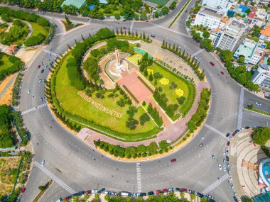 Vung Tau view from above, with traffic roundabout, house, Vietnam war memorial in Vietnam. This is the biggest roundabout in Vung Tau.