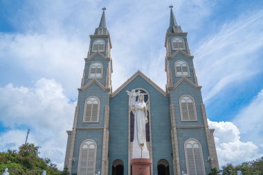 Top view of the Chanh Toa Church in Ba Ria Vung Tau. The light shines on the statue of the Virgin Mary.