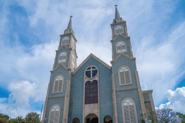 Top view of the Chanh Toa Church in Ba Ria Vung Tau. The light shines on the statue of the Virgin Mary.
