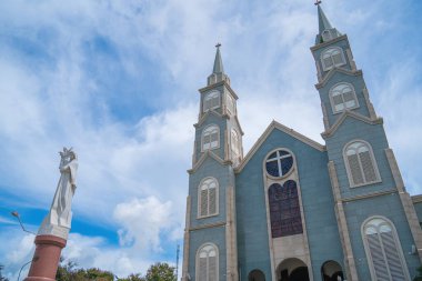 Top view of the Chanh Toa Church in Ba Ria Vung Tau. The light shines on the statue of the Virgin Mary.