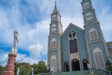 Top view of the Chanh Toa Church in Ba Ria Vung Tau. The light shines on the statue of the Virgin Mary.