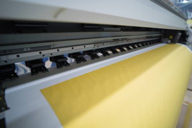 Interior factory Large printing machine for paper business in printing room. Sublimation concept.