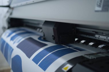 Interior factory Large printing machine for paper business in printing room. Sublimation concept.