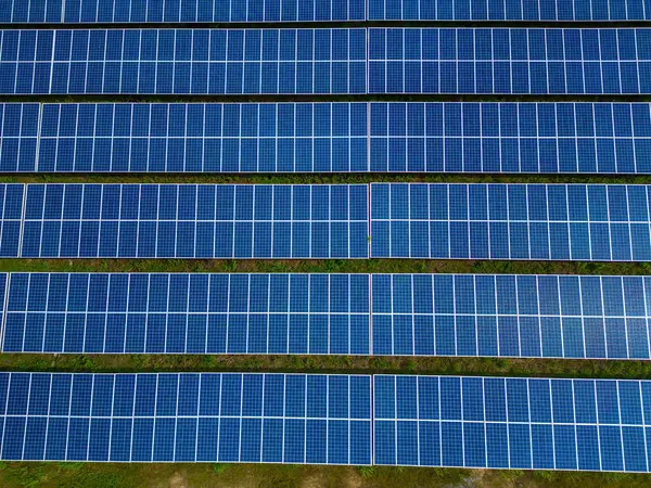 Top view of Solar panels on farm. Alternative source of electricity. solar panels absorb sunlight as a source of energy to generate electricity creating sustainable energy