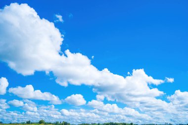 Beautiful view of blue sky with clouds at sunrise. Partly cloudy.Background cloud summer. Cloud summer. Sky cloud clear with sunset. Natural sky cinematic beautiful yellow and white texture background