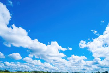 Beautiful view of blue sky with clouds at sunrise. Partly cloudy.Background cloud summer. Cloud summer. Sky cloud clear with sunset. Natural sky cinematic beautiful yellow and white texture background