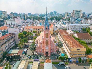 Top view of Tan Dinh Church at night pink color, Romanian style, place with intricate Gothic and Renaissance elements surviving Vietnams turbulent periods. Travel concept