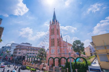 Top view of Tan Dinh Church at night pink color, Romanian style, place with intricate Gothic and Renaissance elements surviving Vietnams turbulent periods. Travel concept