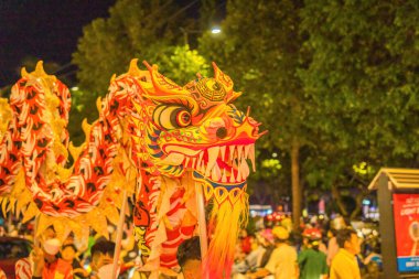 Lion and dragon dance perform celebration new year. Group of people perform a traditional lion dance and dragon dance.