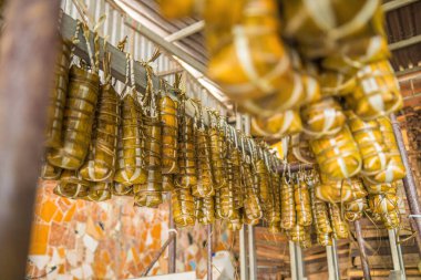 Focus Vietnamese Sticky Rice Cake (tet cake) hang in shelves after hard-boiled, Vietnamese traditional new year food. the most important food of Vietnamese lunar new year Tet.