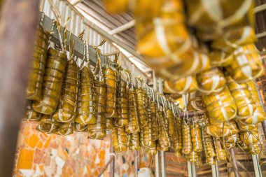 Focus Vietnamese Sticky Rice Cake (tet cake) hang in shelves after hard-boiled, Vietnamese traditional new year food. the most important food of Vietnamese lunar new year Tet.