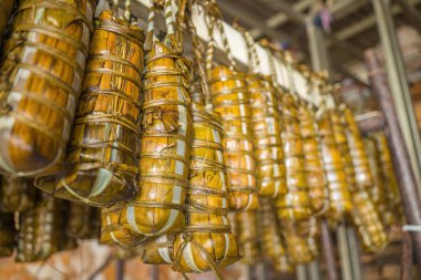 Focus Vietnamese Sticky Rice Cake (tet cake) hang in shelves after hard-boiled, Vietnamese traditional new year food. the most important food of Vietnamese lunar new year Tet.