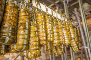 Focus Vietnamese Sticky Rice Cake (tet cake) hang in shelves after hard-boiled, Vietnamese traditional new year food. the most important food of Vietnamese lunar new year Tet.